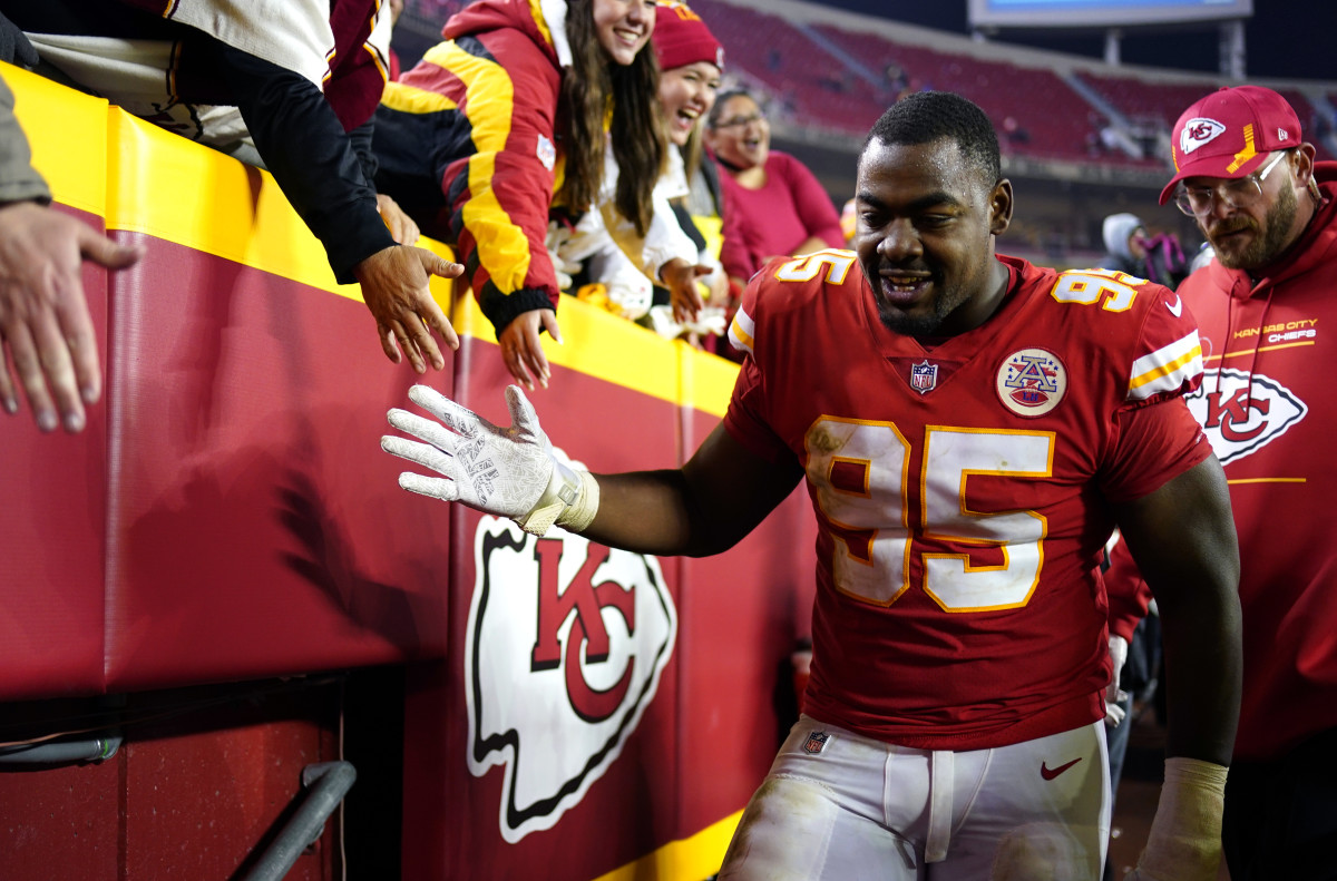 Nov 1, 2021; Kansas City, Missouri, USA; Kansas City Chiefs defensive end Chris Jones (95) celebrates with fans in the stands after defeating the New York Giants at GEHA Field at Arrowhead Stadium. Mandatory Credit: Jay Biggerstaff-USA TODAY Sports